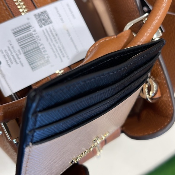 Kate Spade Madison Small Slim Card Holder
Toasted Hazelnut Multi
NWT - Picture 13 of 16